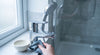 How to remove limescale from taps and shower heads