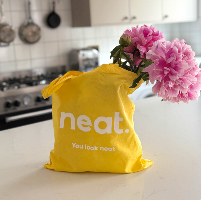 neat. Tote Bag