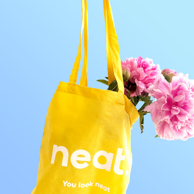 neat. Tote Bag